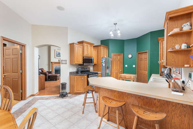 2658 East 1559th Road Ottawa, IL 61350 - Photo 29 of 53 a large kitchen with a table and chairs