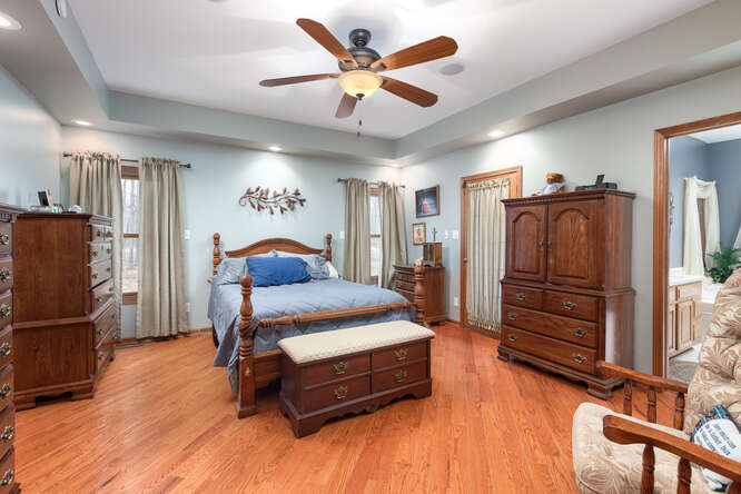 2658 East 1559th Road Ottawa, IL 61350 - Photo 30 of 53 a bedroom with a bed and a refrigerator