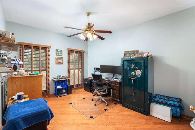2658 East 1559th Road Ottawa, IL 61350 - Photo 37 of 53 a workspace with furniture window and a ceiling fan