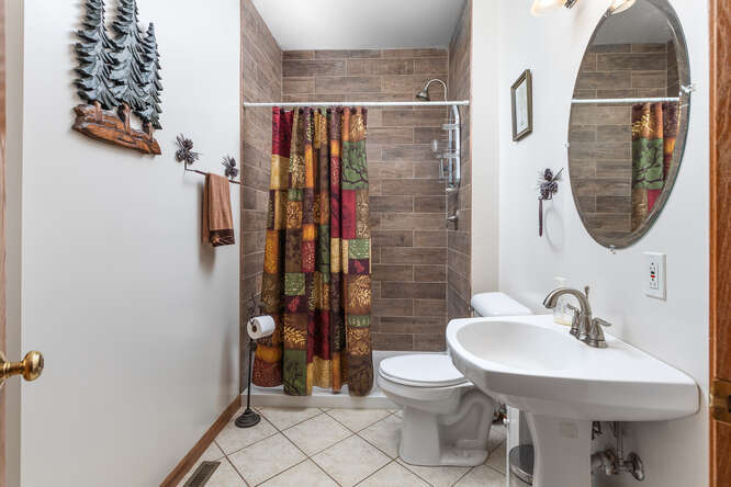 2658 East 1559th Road Ottawa, IL 61350 - Photo 41 of 53 a bathroom with a sink toilet and shower