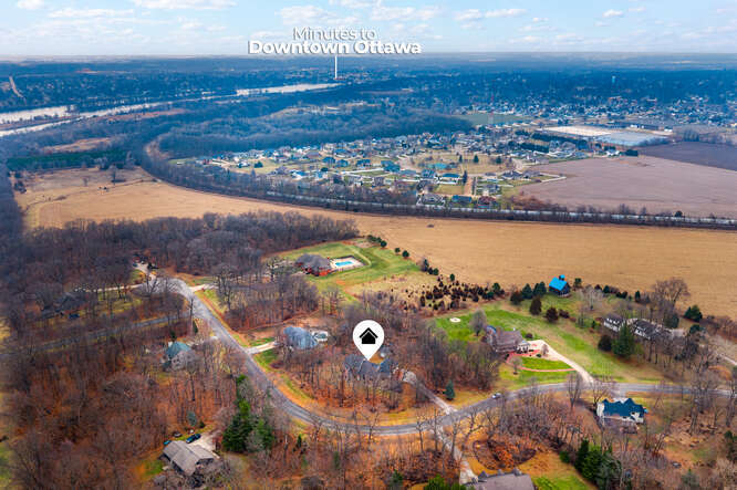 2658 East 1559th Road Ottawa, IL 61350 - Photo 49 of 53 an aerial view of a city with lots of residential buildings ocean and mountain view in back