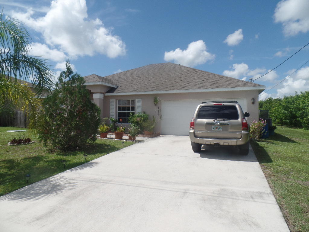 4366 Southwest Appleseed Road Port St. Lucie, FL 34953 - Photo 1 of 9 front