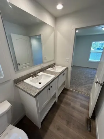 a bathroom with a sink and a mirror