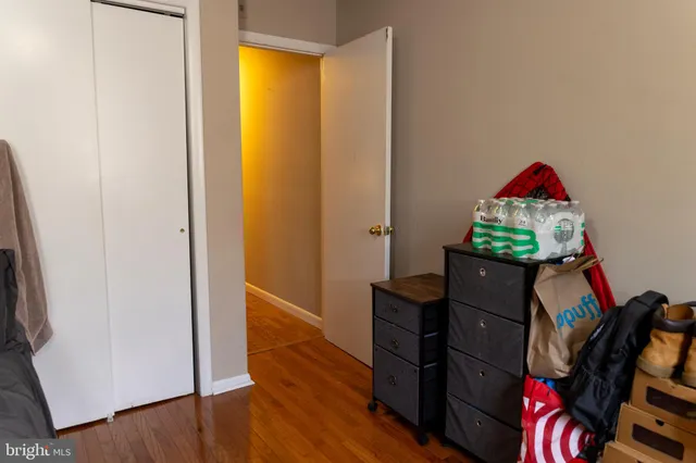 a kitchen with stainless steel appliances granite countertop a refrigerator and a stove