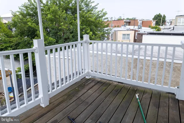 a view of a balcony with a sink
