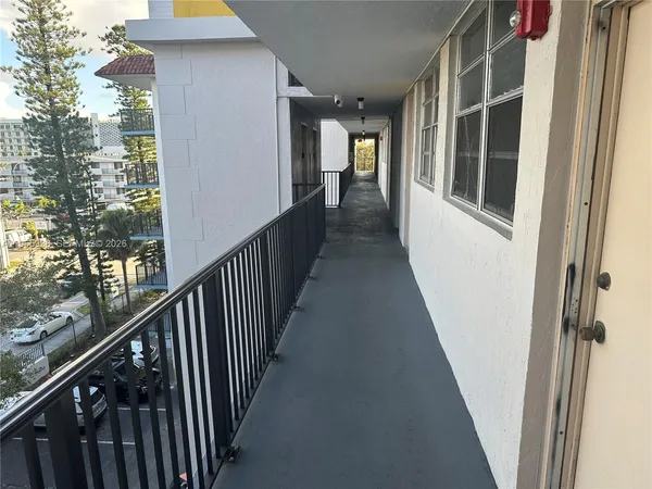 a view of a porch with a yard