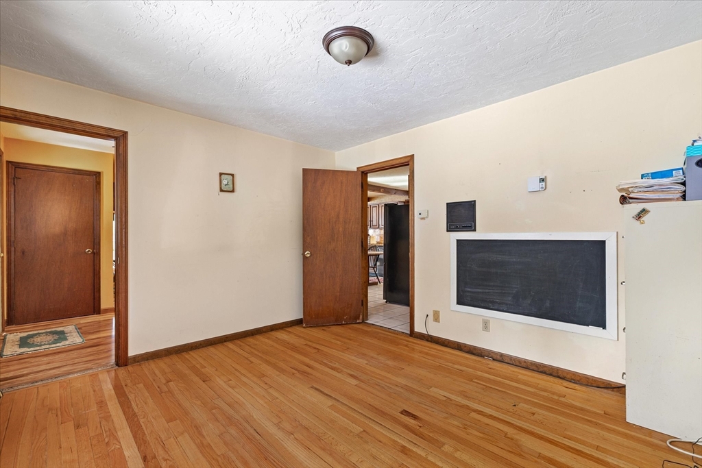 100 Asnebumskit Road Paxton, MA 01612 - Photo 11 of 42 a view of a livingroom with wooden floor