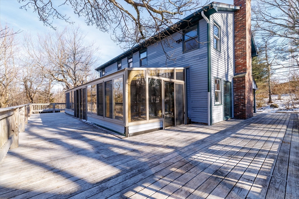 100 Asnebumskit Road Paxton, MA 01612 - Photo 16 of 42 a view of a house with a large windows