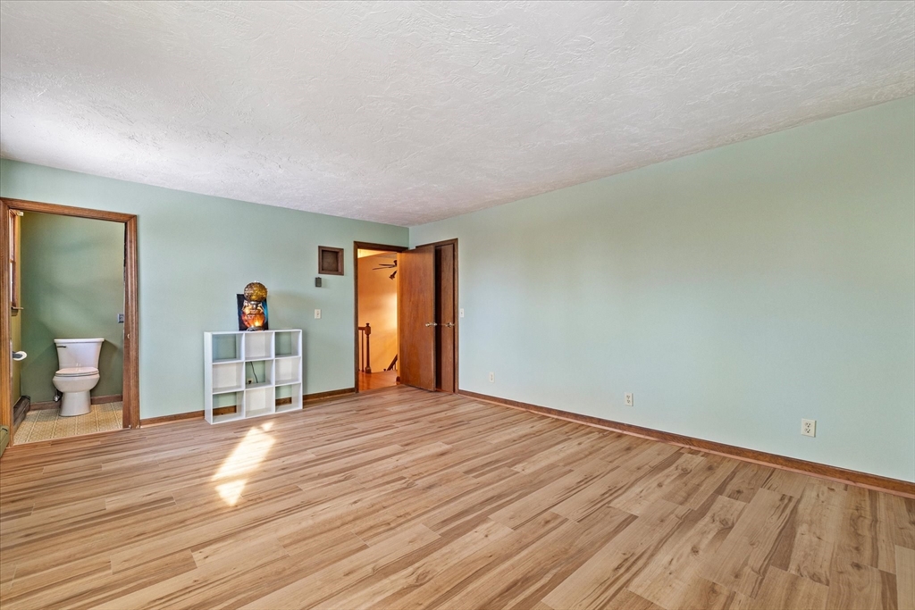 100 Asnebumskit Road Paxton, MA 01612 - Photo 20 of 42 a view of empty room with wooden floor
