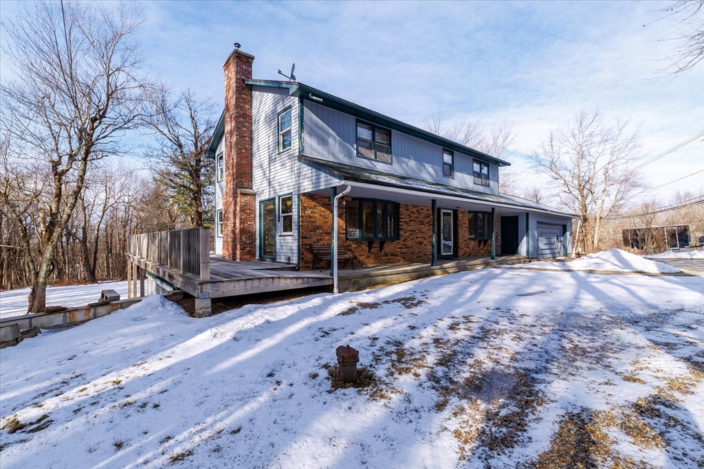 100 Asnebumskit Road Paxton, MA 01612 - Photo 36 of 42 a view of house with yard and wooden fence