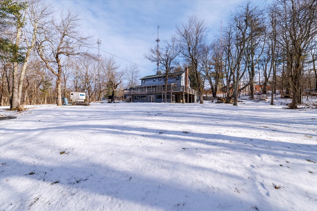 100 Asnebumskit Road Paxton, MA 01612 - Photo 38 of 42 a view of road with with trees