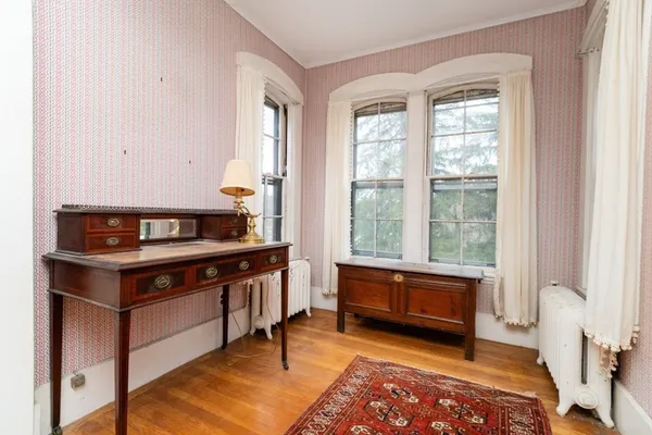 a kitchen with a stove and a window