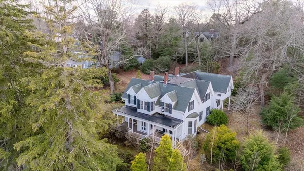 an aerial view of a house with a garden