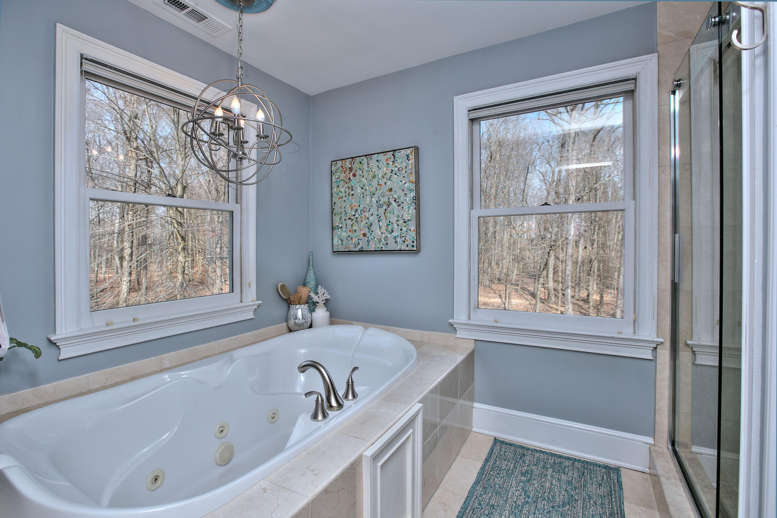 191 Smith Ridge Road New Canaan, CT 06840 - Photo 22 of 42 a bathroom with a bathtub and a shower