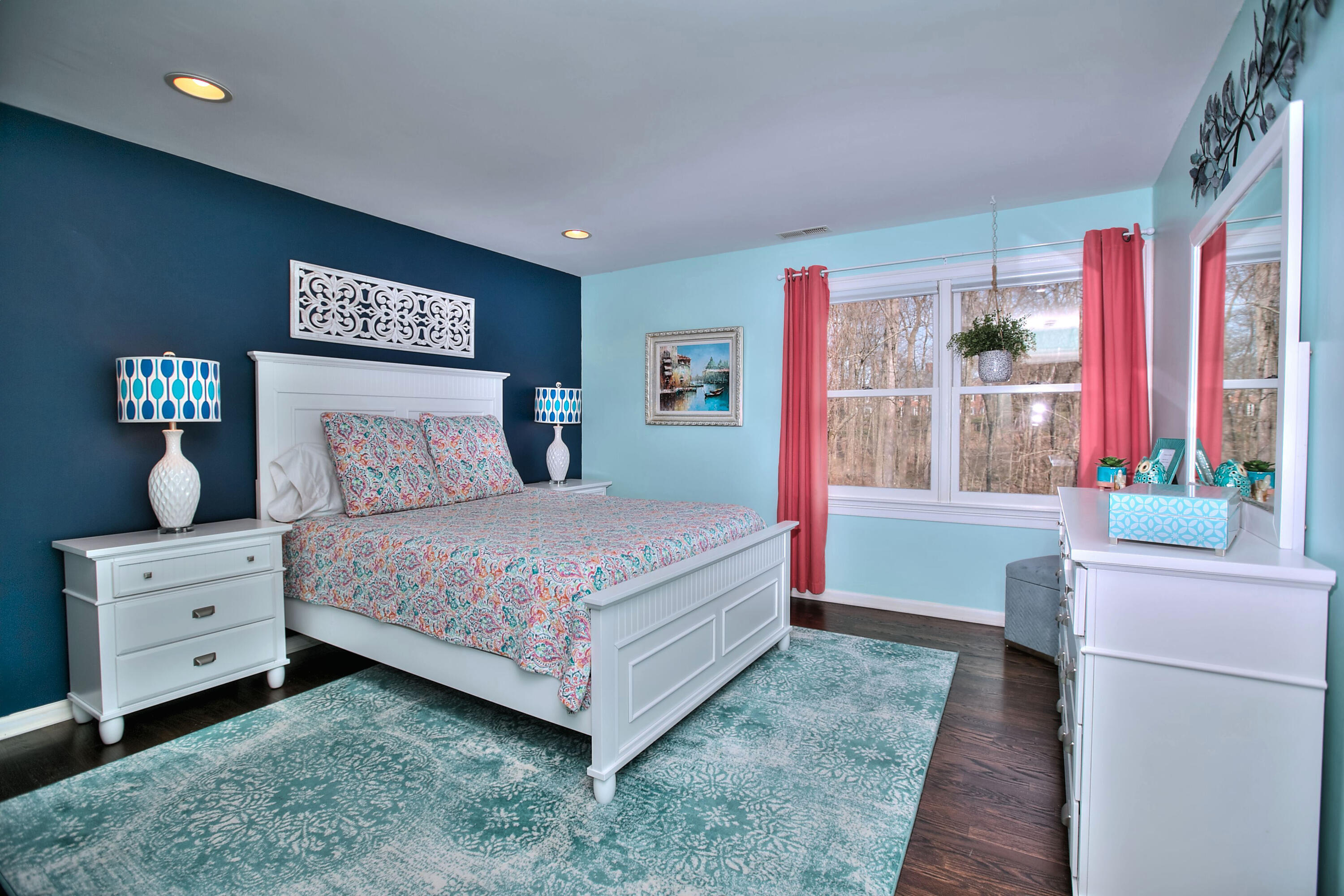 191 Smith Ridge Road New Canaan, CT 06840 - Photo 23 of 42 a bedroom with a bed and a dresser next to a window