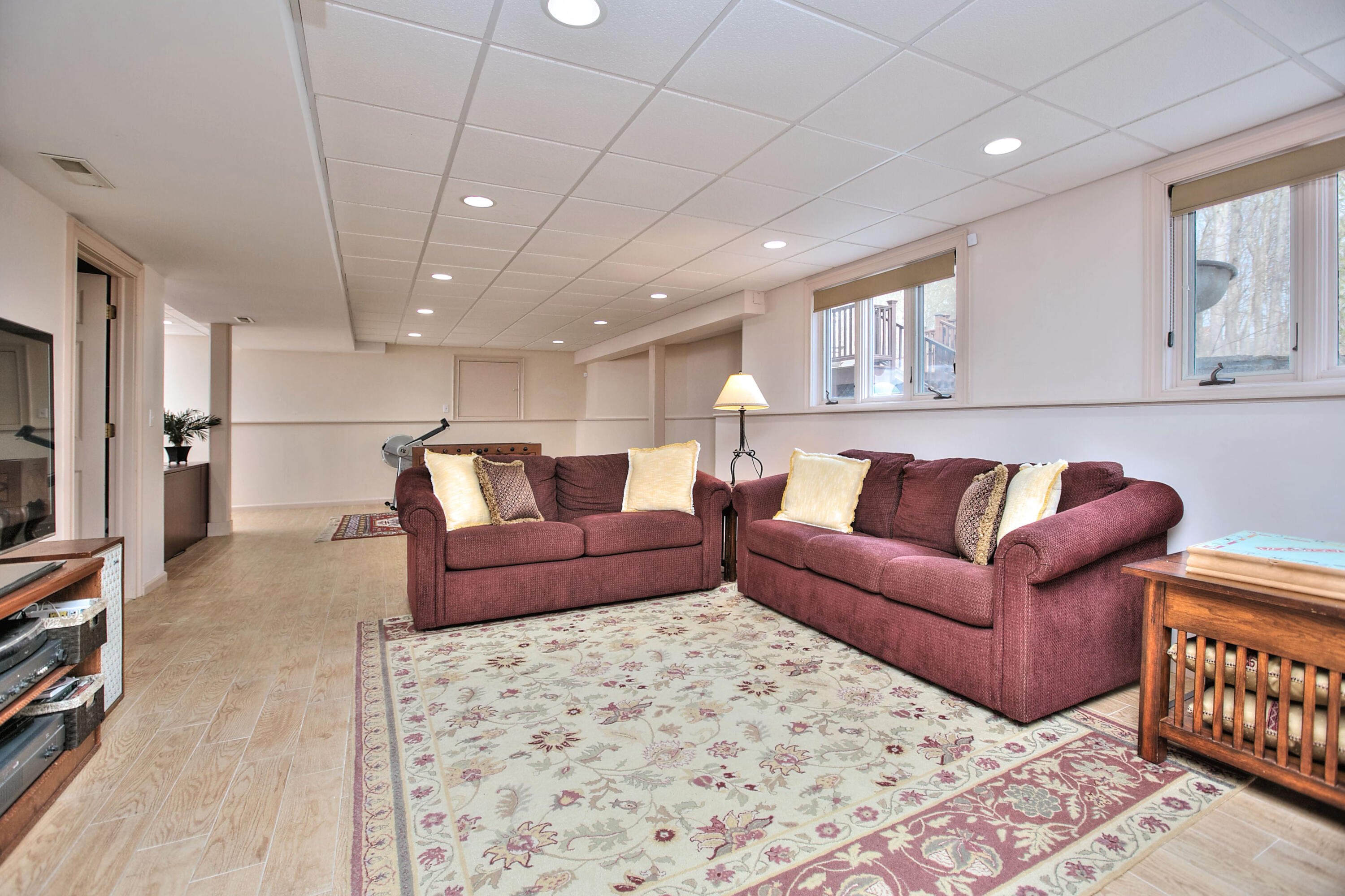191 Smith Ridge Road New Canaan, CT 06840 - Photo 29 of 42 a living room with furniture and a couch