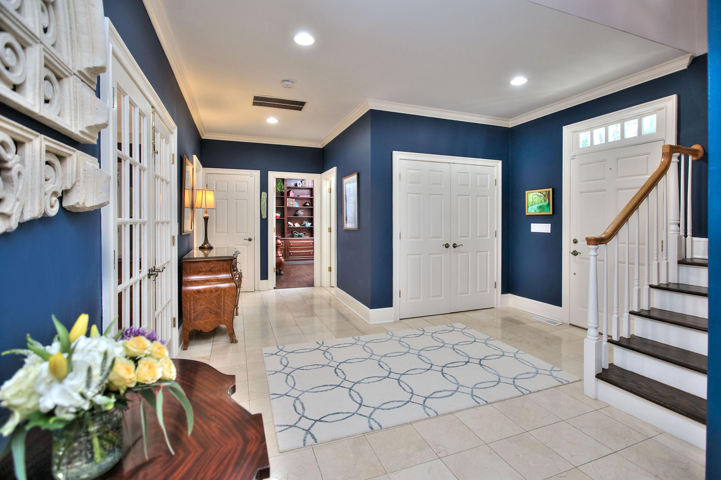 191 Smith Ridge Road New Canaan, CT 06840 - Photo 3 of 42 a view of entryway with livingroom and chandelier