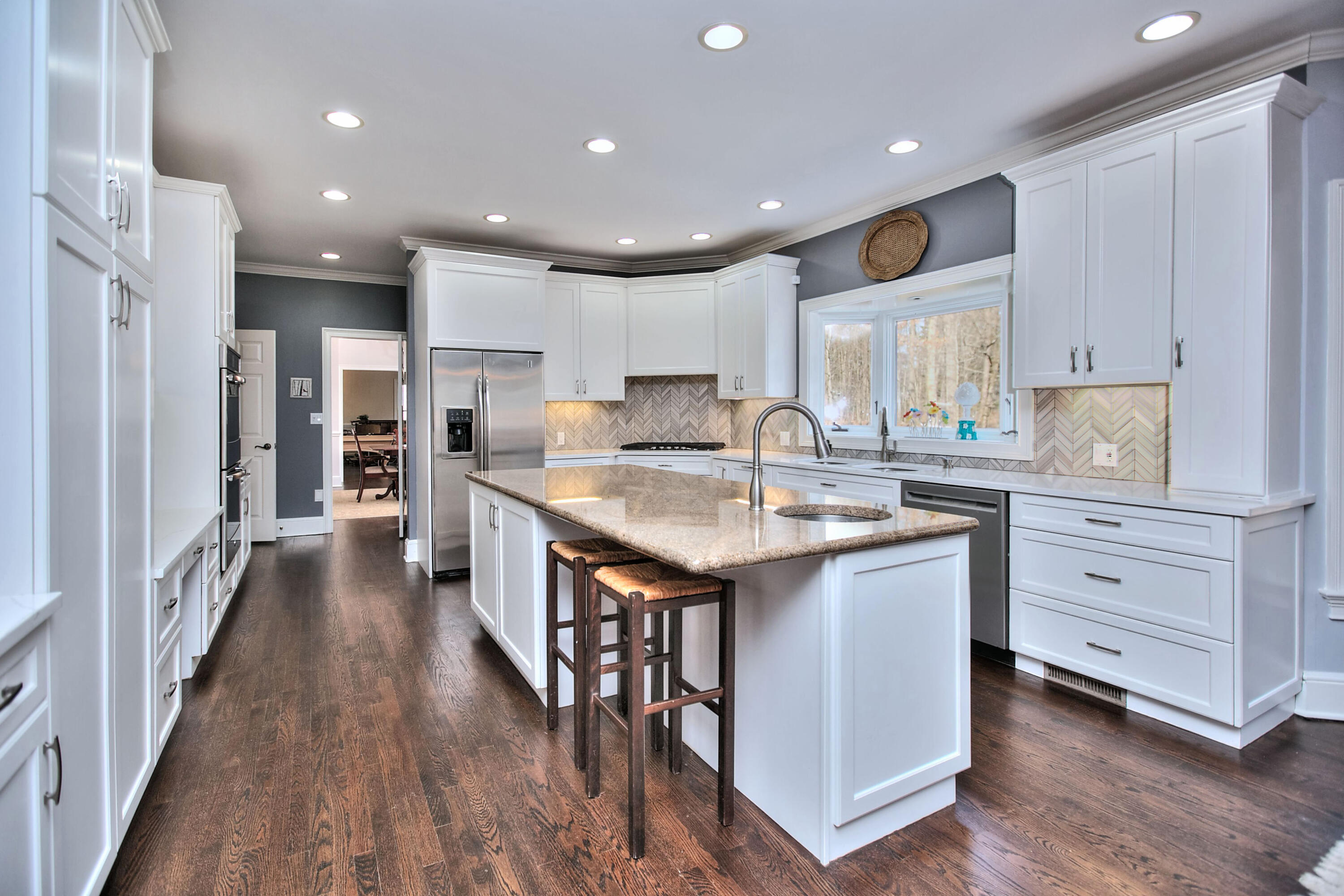 191 Smith Ridge Road New Canaan, CT 06840 - Photo 7 of 42 a kitchen with counter top space sink and refrigerator