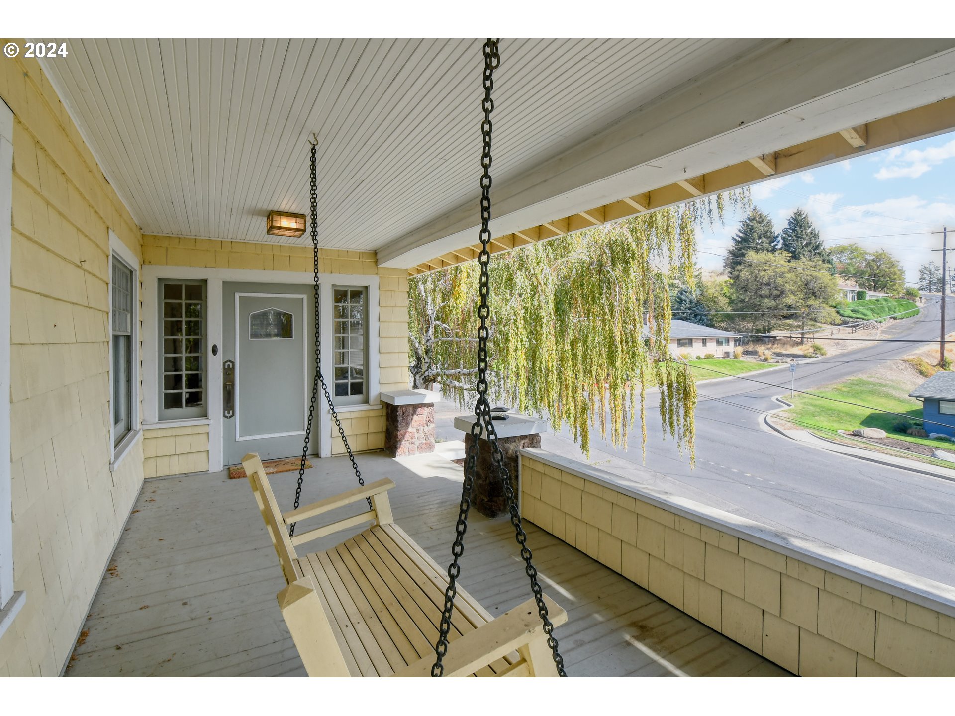 421 North Main Street Pendleton, OR 97801 - Photo 3 of 48 a living room with a floor to ceiling window and wooden floor
