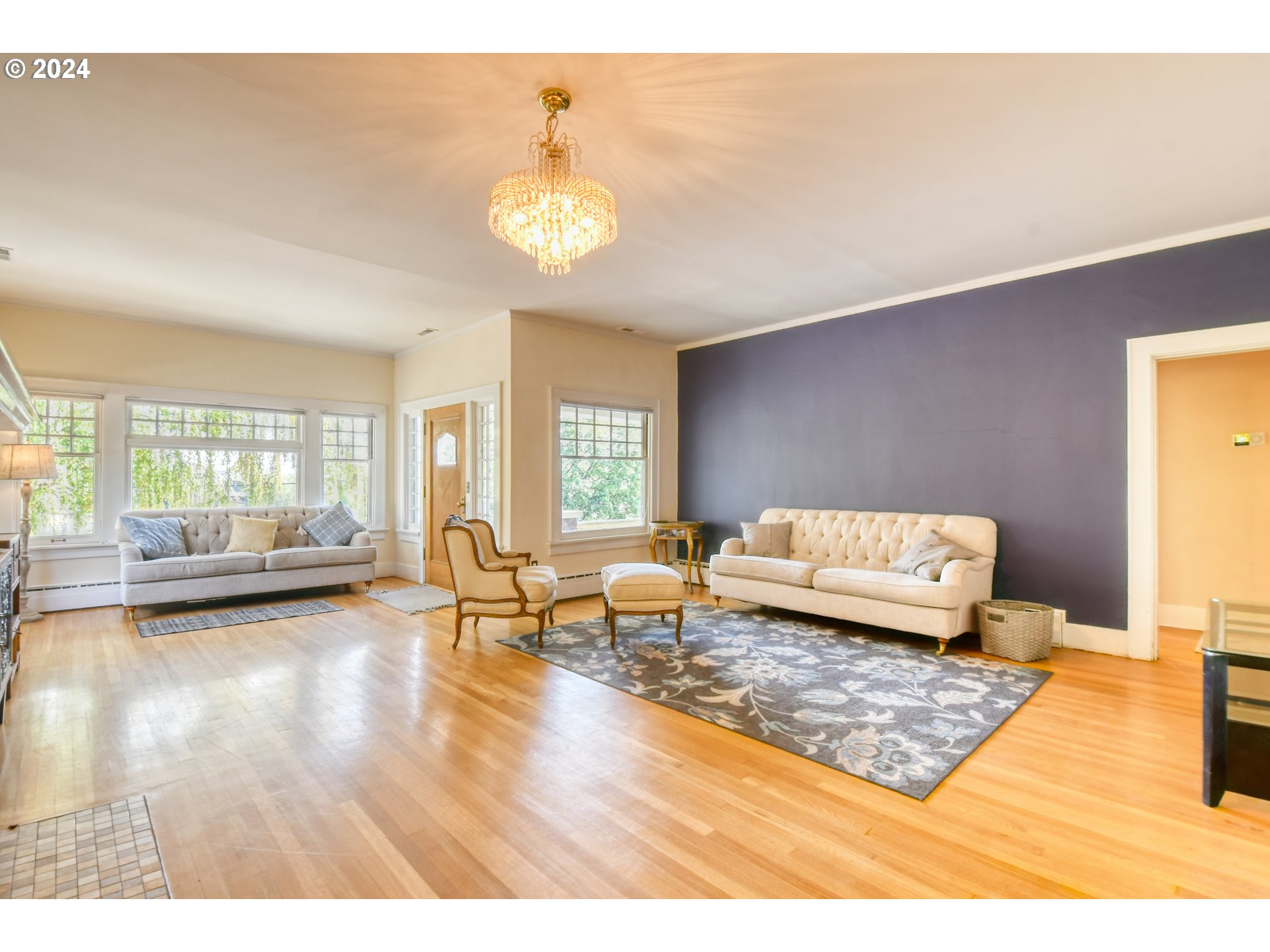 421 North Main Street Pendleton, OR 97801 - Photo 6 of 48 a living room with furniture and a wooden floor