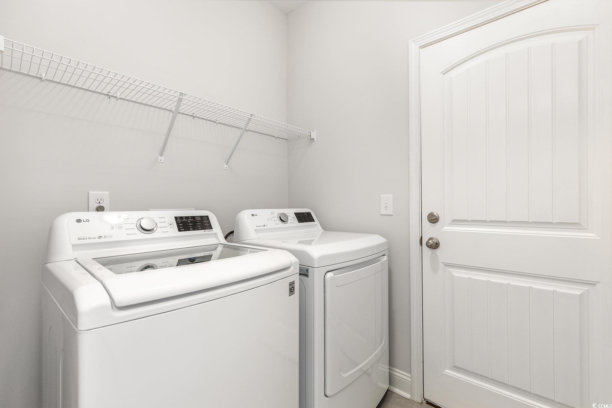 1438 Perch Place Longs, SC 29568 - Photo 13 of 39 Laundry room featuring washing machine and clothes