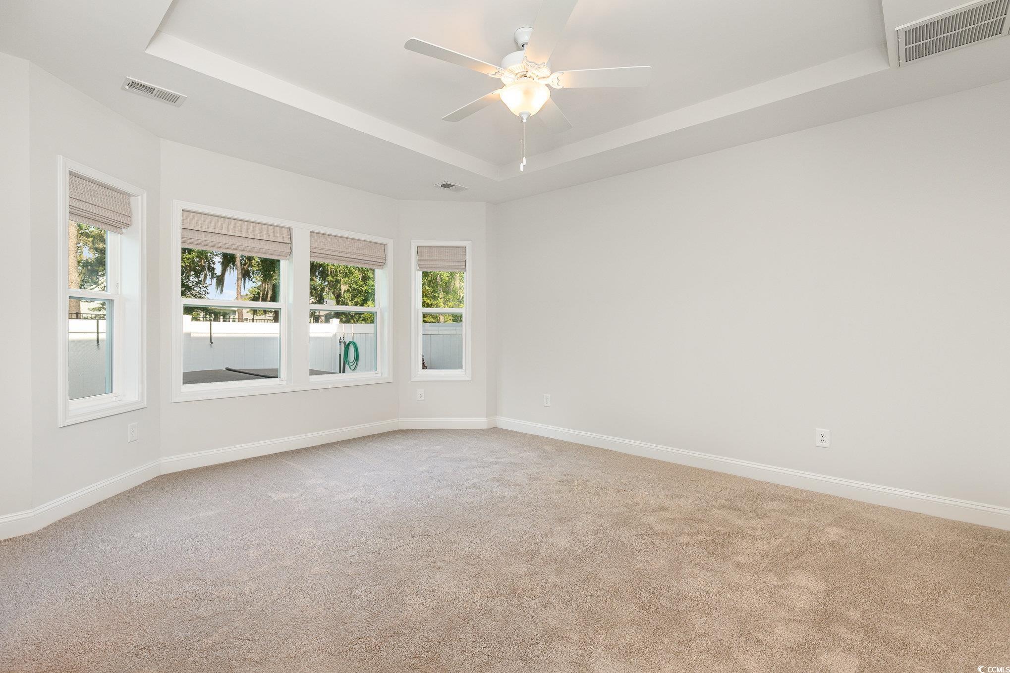 1438 Perch Place Longs, SC 29568 - Photo 14 of 39 Carpeted spare room with a healthy amount of sunli