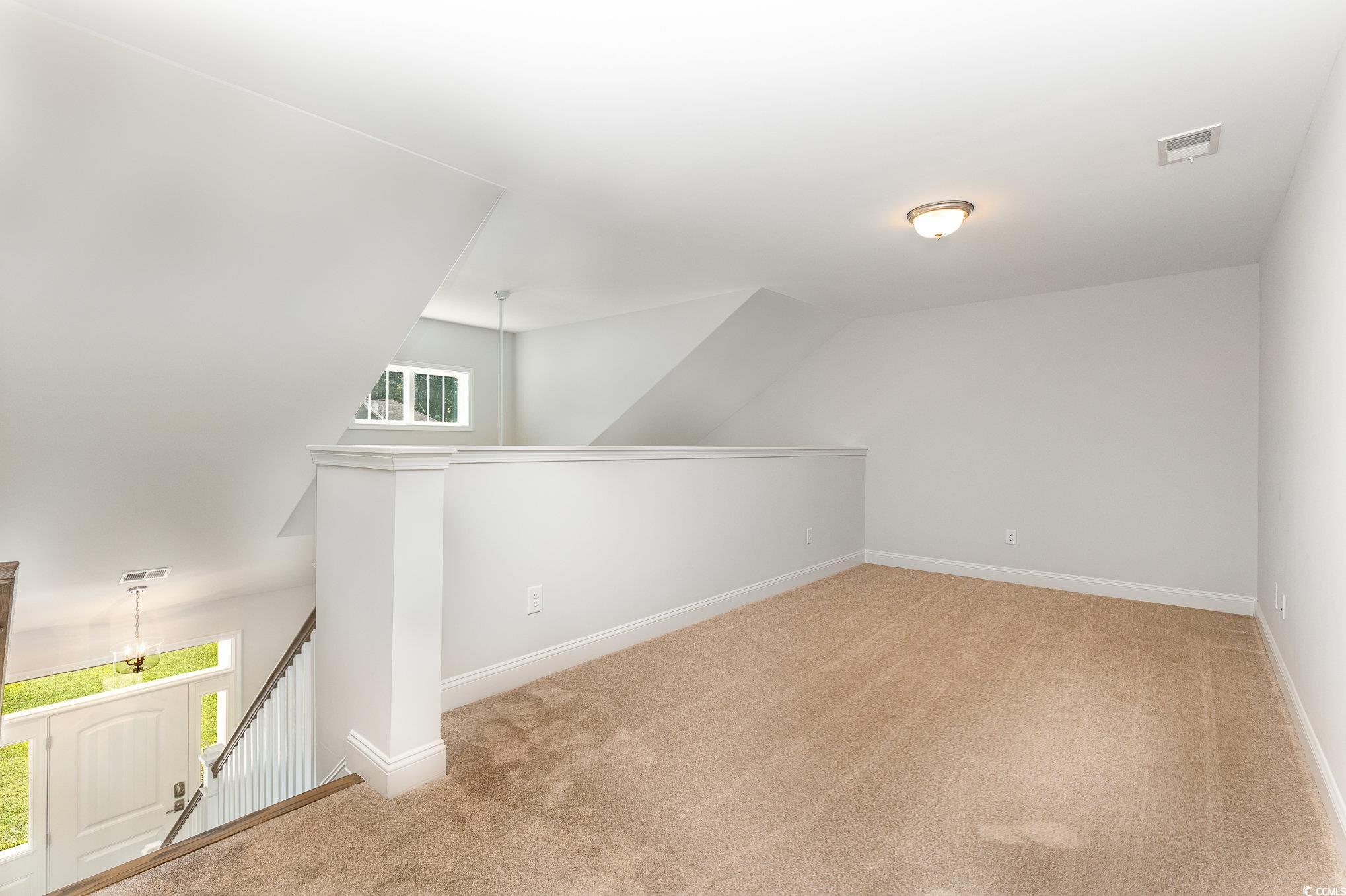 1438 Perch Place Longs, SC 29568 - Photo 20 of 39 Additional living space featuring lofted ceiling a