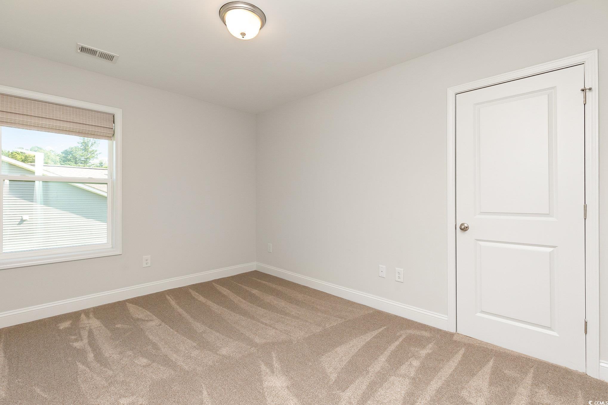 1438 Perch Place Longs, SC 29568 - Photo 25 of 39 View of carpeted empty room