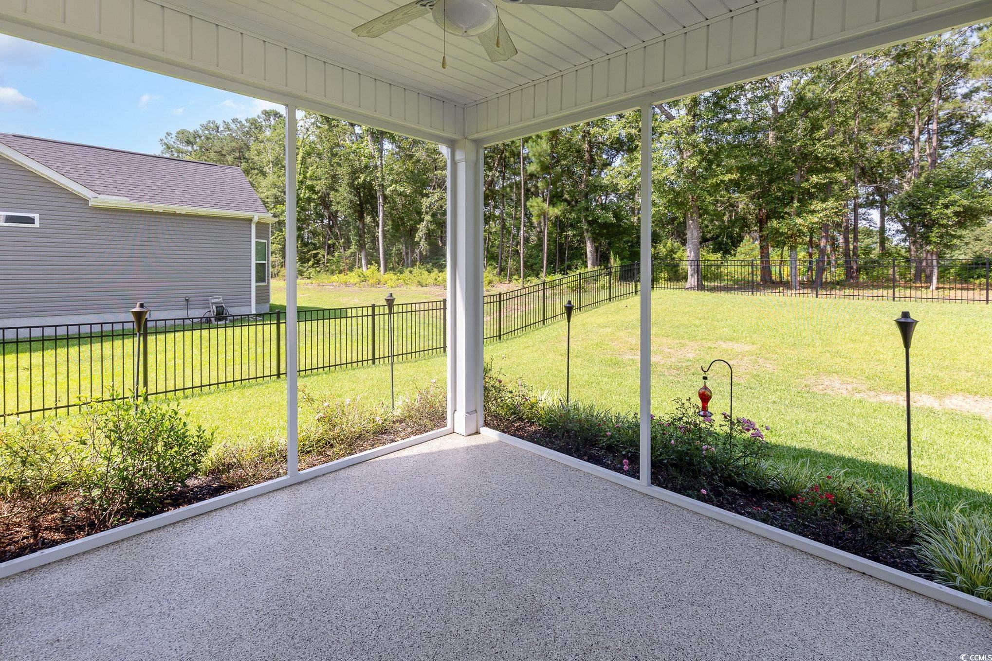 1438 Perch Place Longs, SC 29568 - Photo 29 of 39 Unfurnished sunroom with ceiling fan