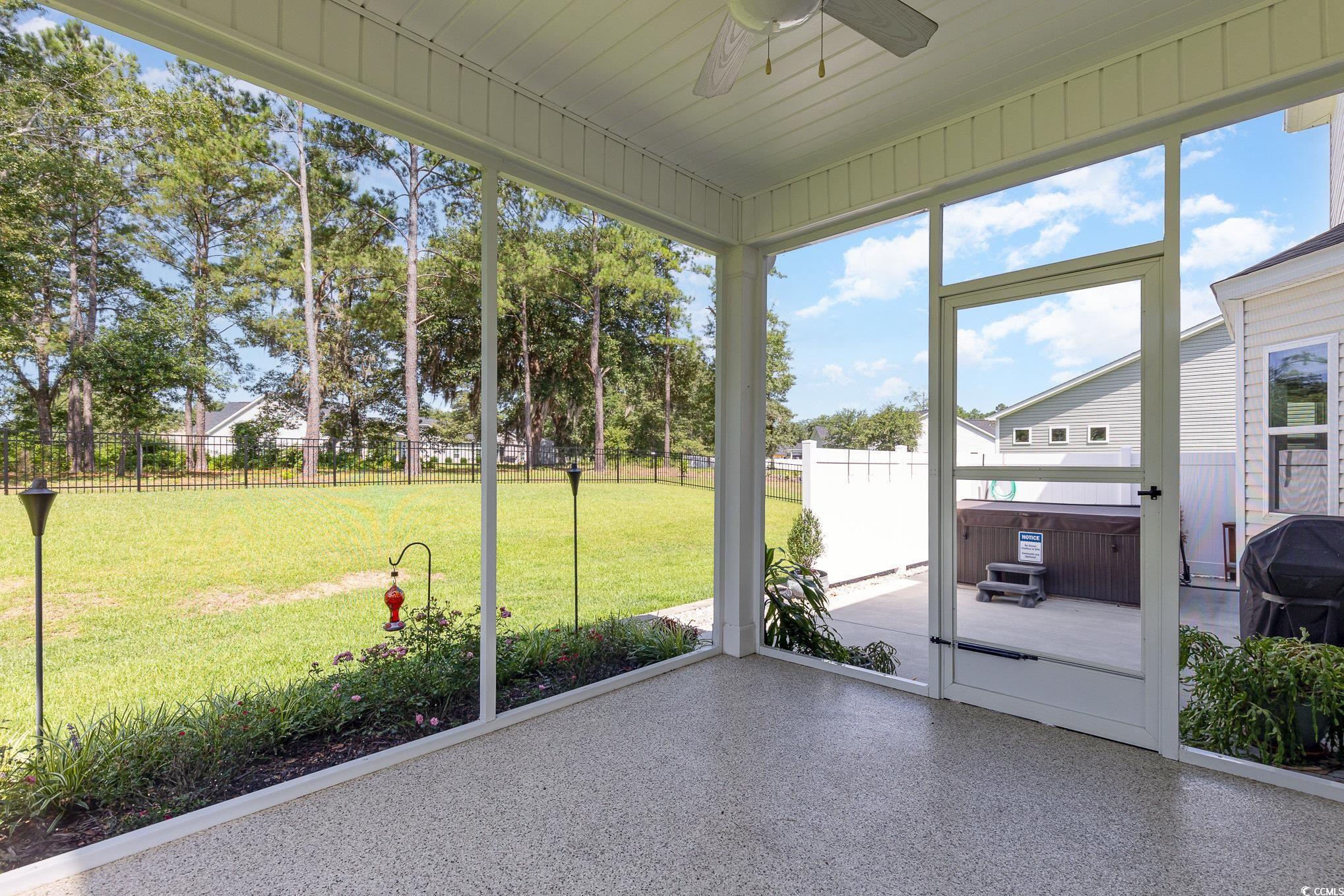 1438 Perch Place Longs, SC 29568 - Photo 30 of 39 Unfurnished sunroom with ceiling fan