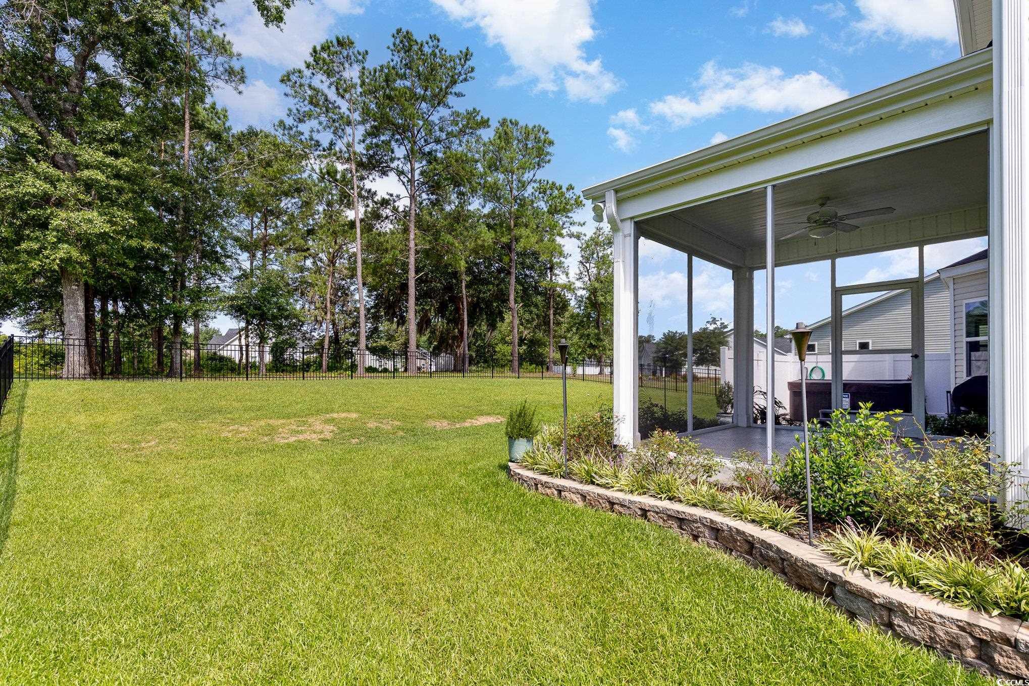 1438 Perch Place Longs, SC 29568 - Photo 32 of 39 View of yard featuring ceiling fan