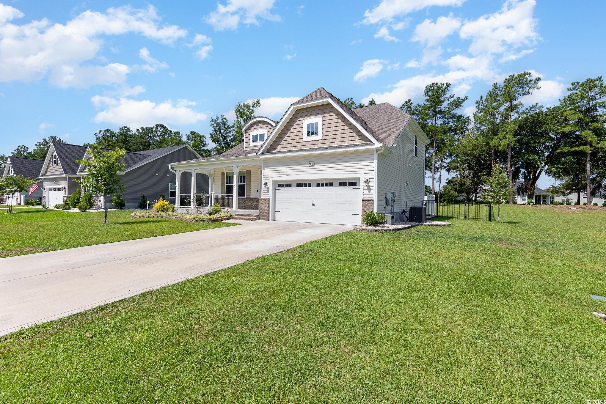 1438 Perch Place Longs, SC 29568 - Photo 36 of 39 View of front of home with a garage, a front lawn,