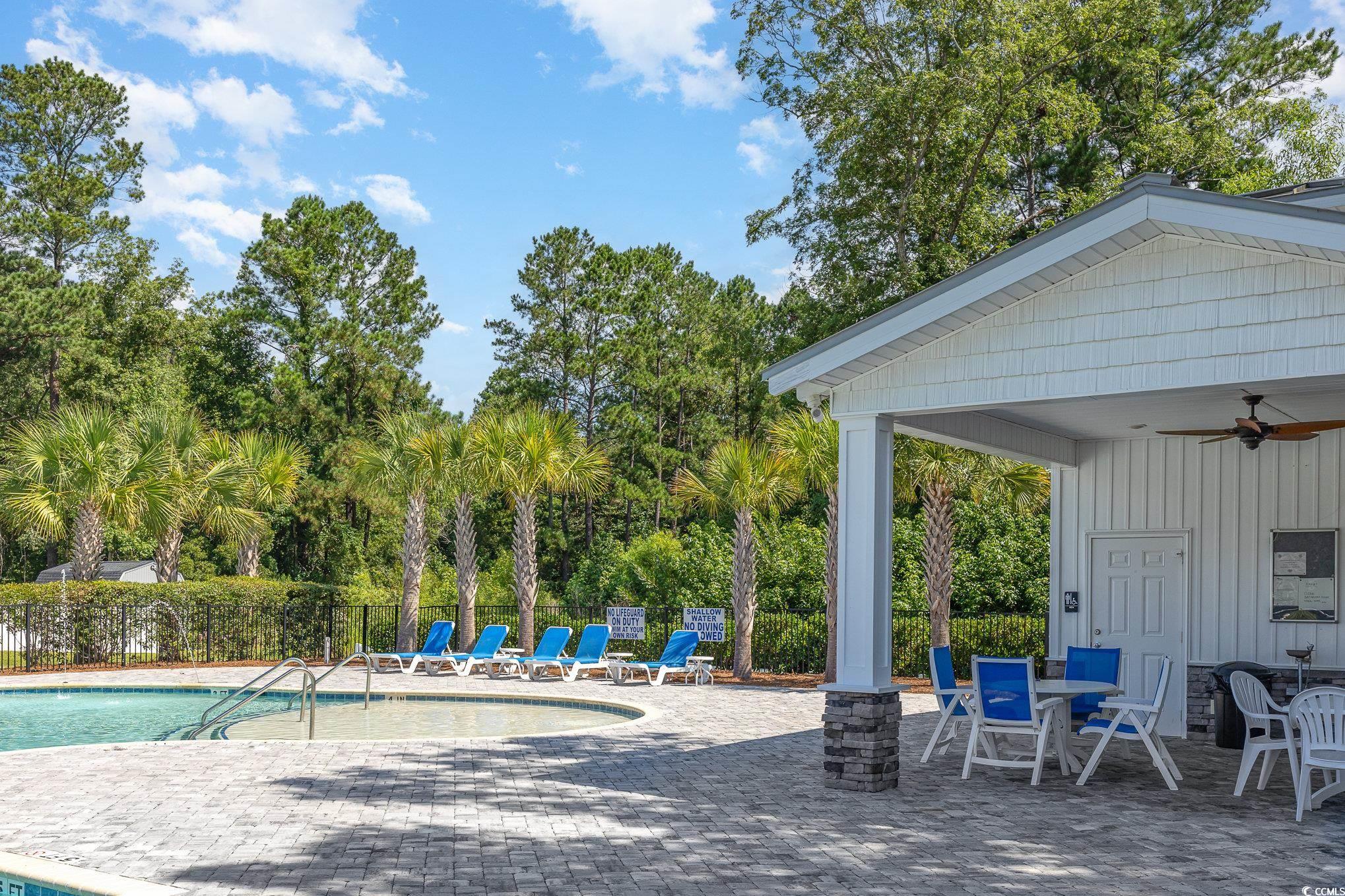 1438 Perch Place Longs, SC 29568 - Photo 39 of 39 View of swimming pool featuring a patio and ceilin