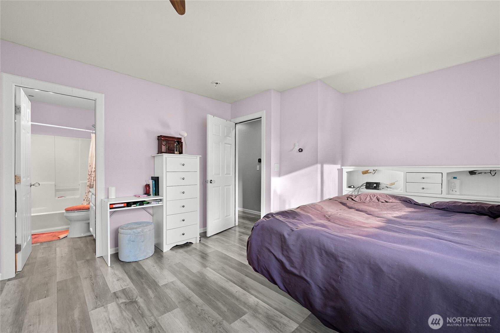 6196 Quail Court Ferndale, WA 98248 - Photo 13 of 27 a bed room with a bed and cabinets