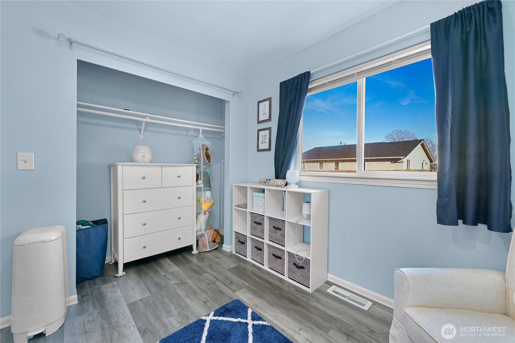 6196 Quail Court Ferndale, WA 98248 - Photo 16 of 27 a room with a wooden floor and furniture