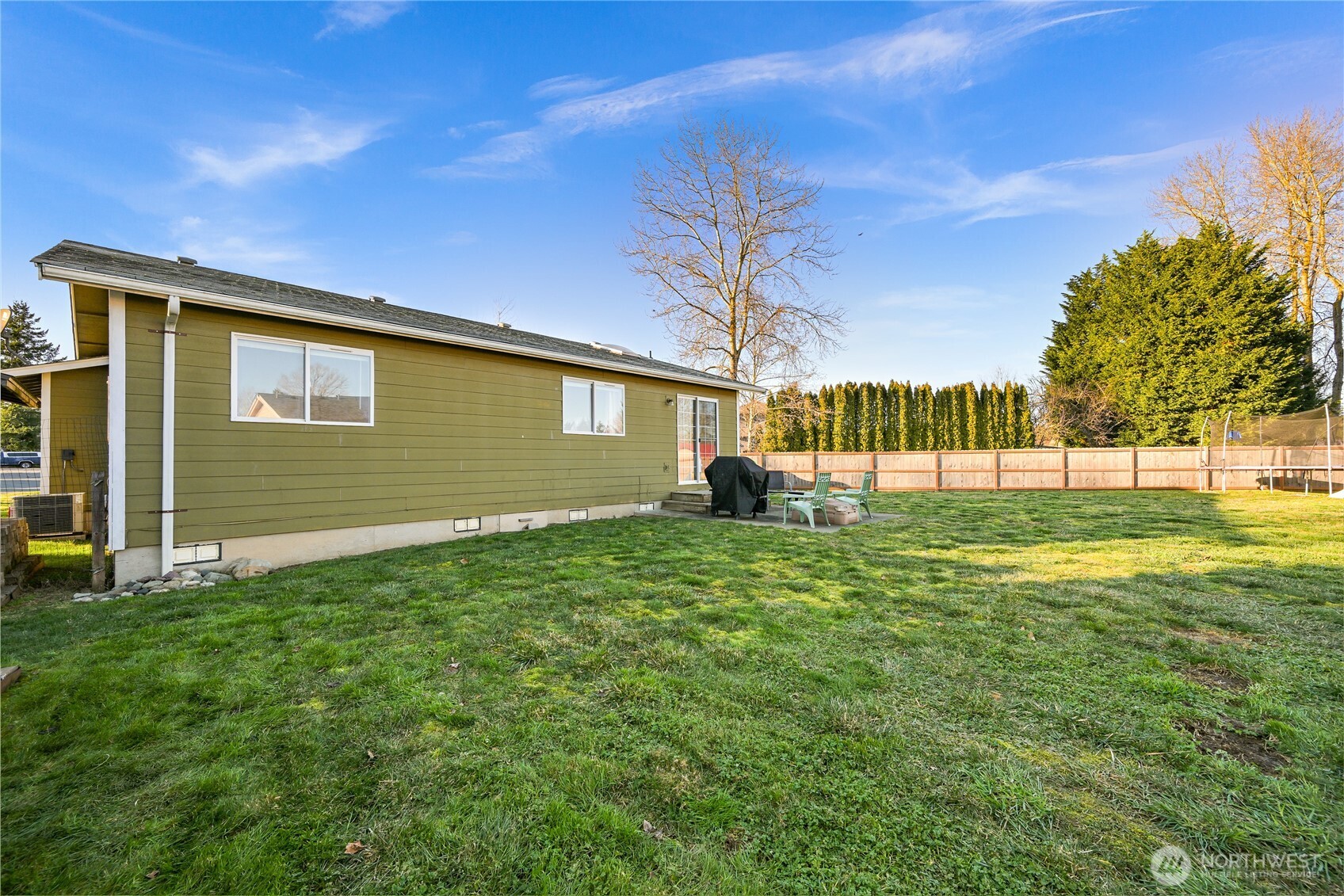 6196 Quail Court Ferndale, WA 98248 - Photo 22 of 27 a view of a backyard with a garden