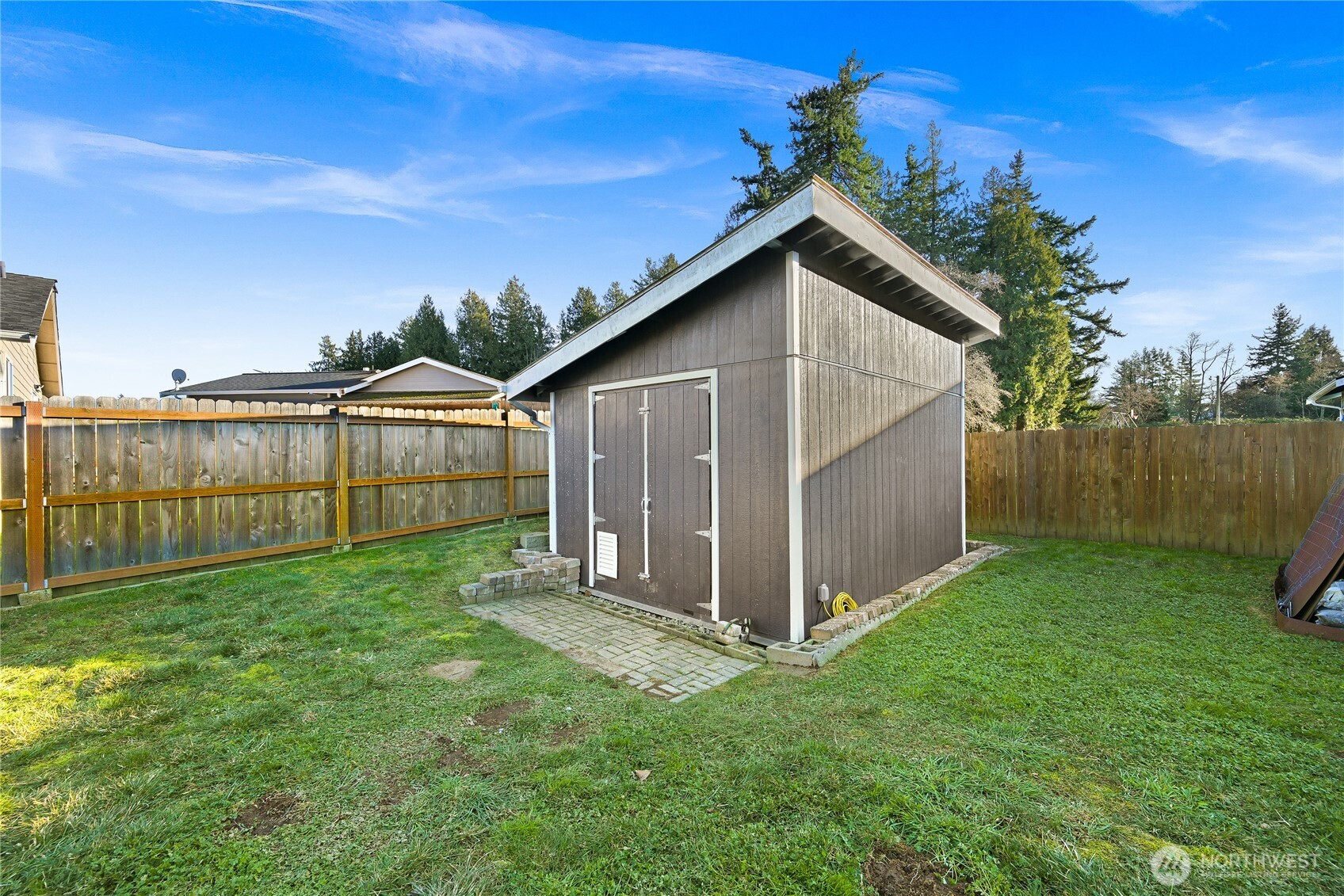 6196 Quail Court Ferndale, WA 98248 - Photo 24 of 27 a view of a backyard with a garden