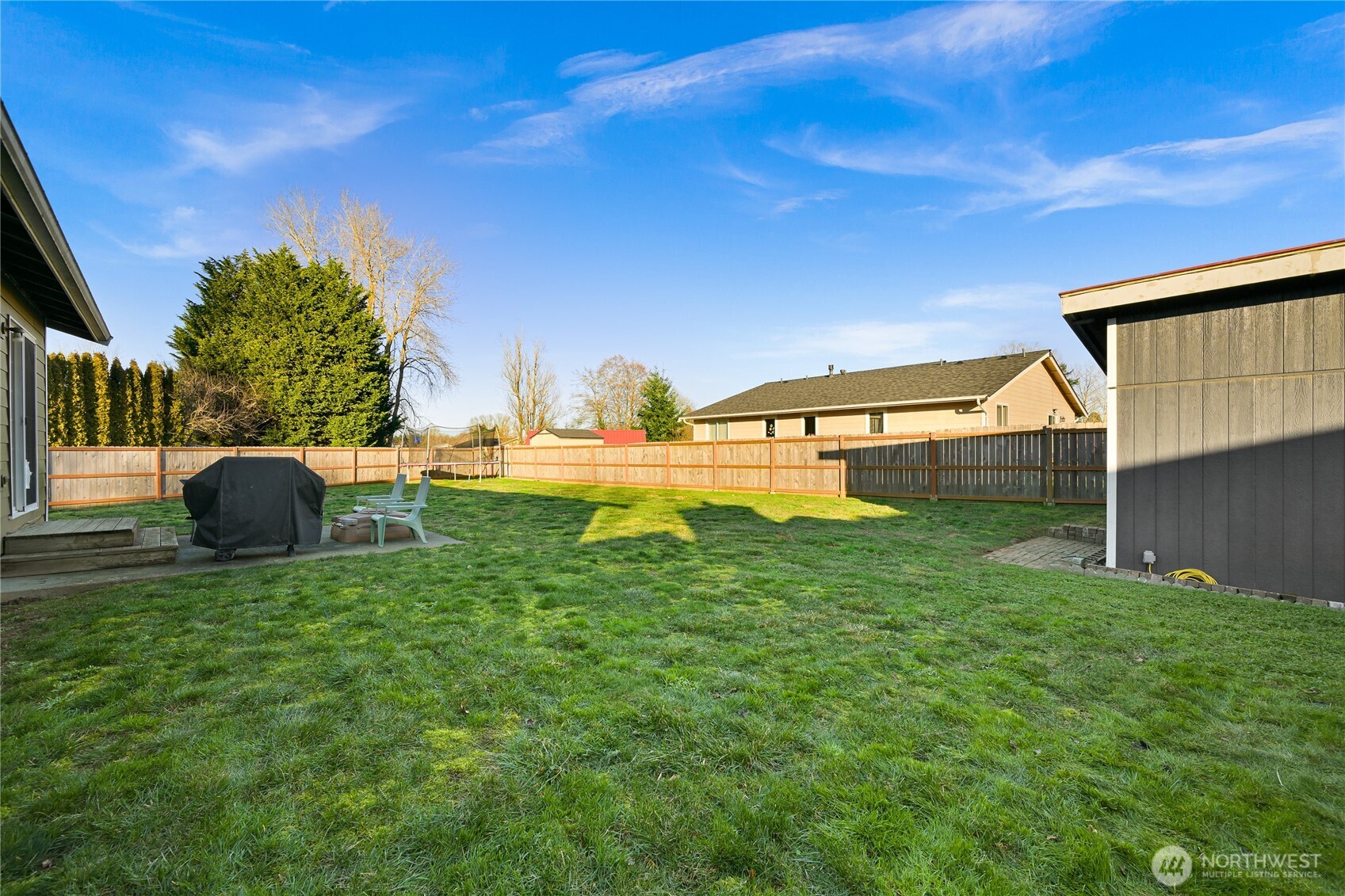 6196 Quail Court Ferndale, WA 98248 - Photo 25 of 27 a backyard of a house with lots of green space