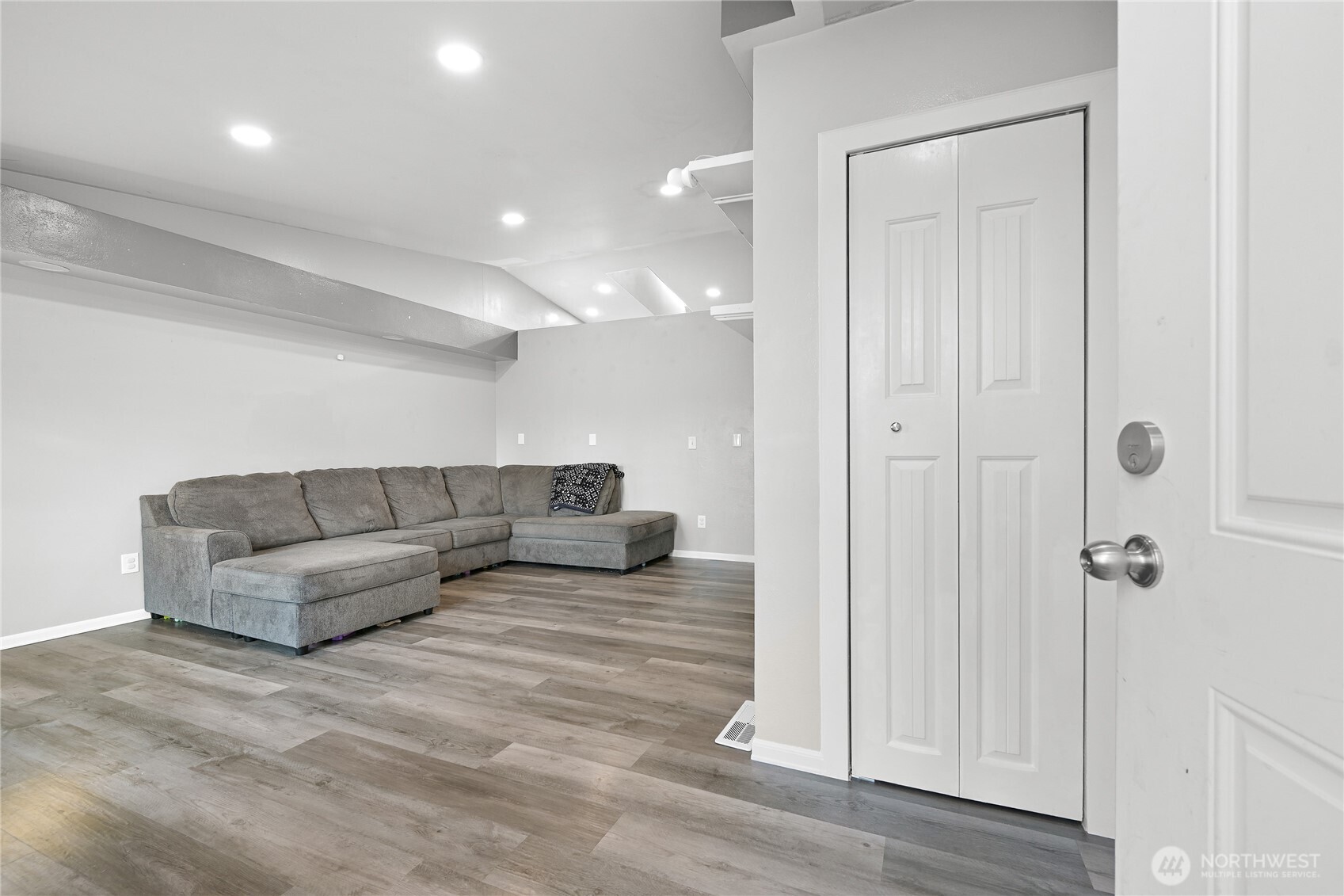 6196 Quail Court Ferndale, WA 98248 - Photo 4 of 27 a living room with furniture and a walk in closet