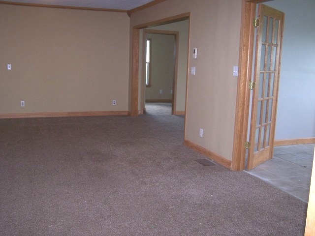 1120 North 32nd Road Ottawa, IL 61350 - Photo 11 of 23 a view of a room with a hallway and closet area
