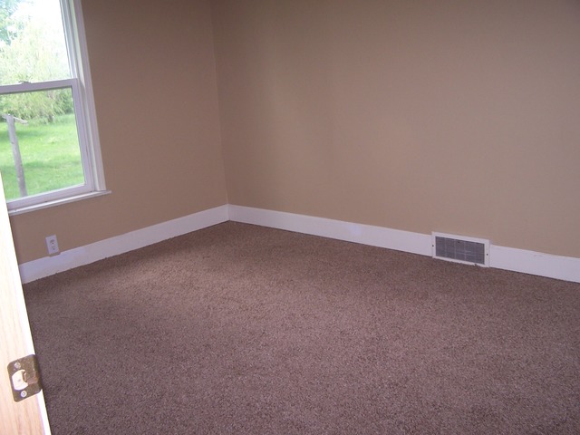 1120 North 32nd Road Ottawa, IL 61350 - Photo 16 of 23 a view of an empty room with a window