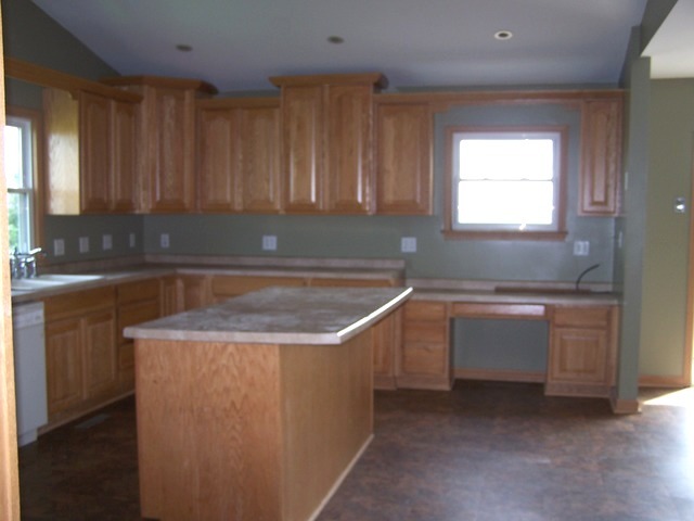 1120 North 32nd Road Ottawa, IL 61350 - Photo 7 of 23 a kitchen with sink a cabinets and window