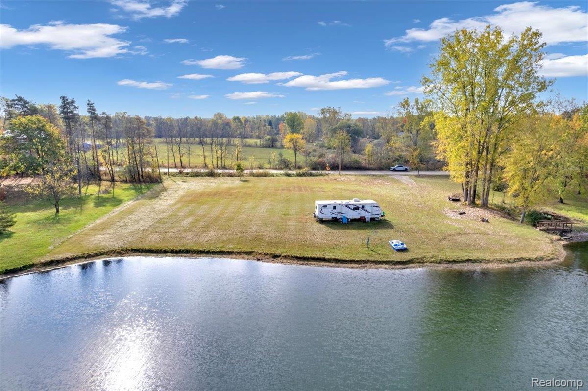 5541 Bordman Road Dryden, MI 48428 - Photo 23 of 27 Drone / aerial view of a large body of water