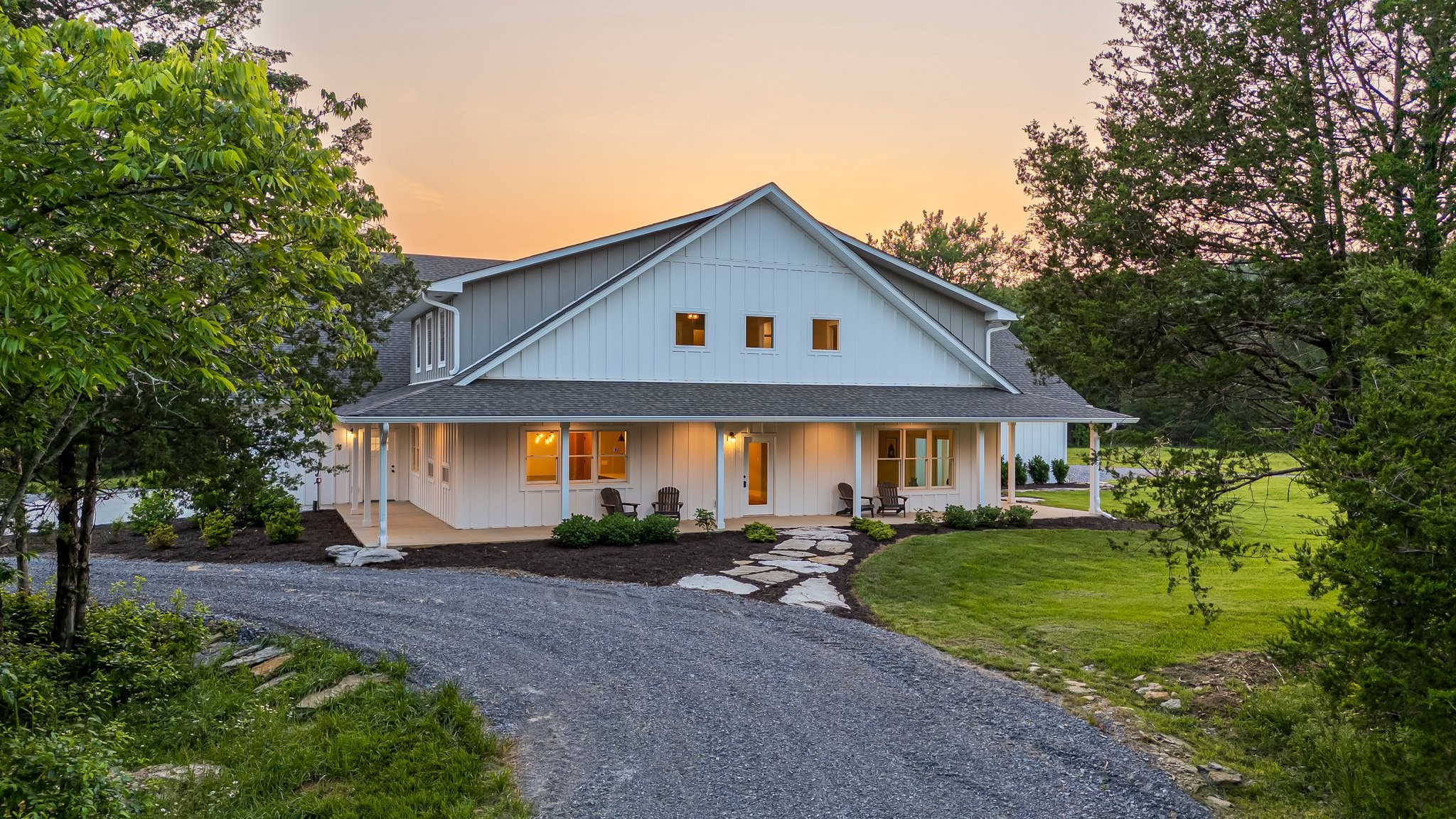 2825 Oregon Road Milton, TN 37118 - Photo 5 of 71 a front view of a house with a yard and potted plants
