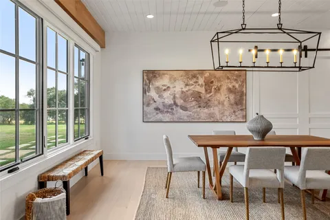 a view of a living room and dining room
