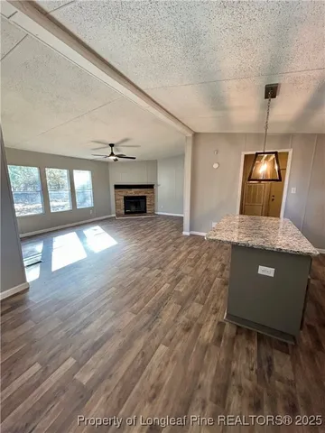 a view of a livingroom with a fireplace