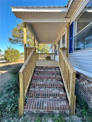 a view of a balcony with staircase