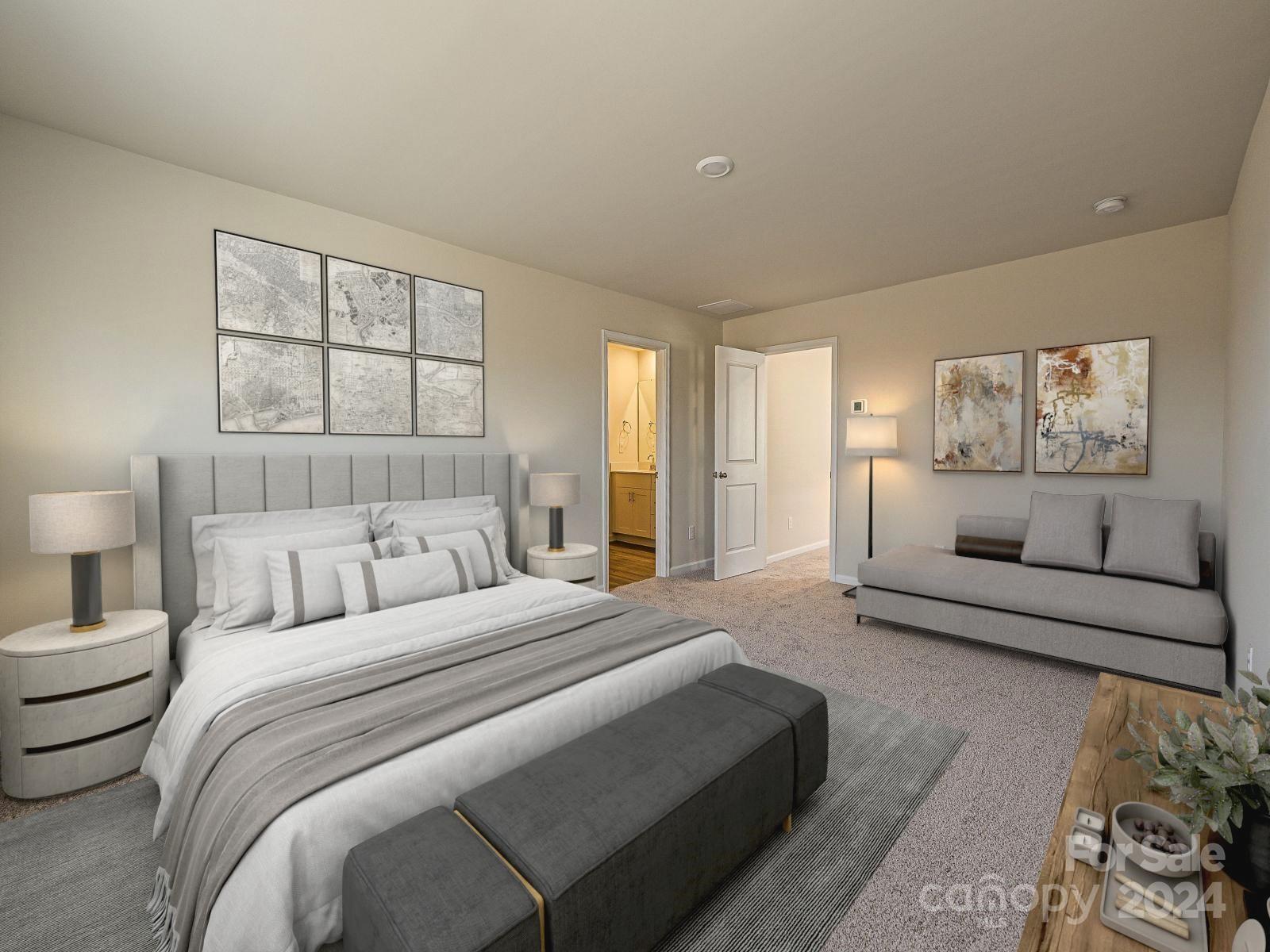 613 Windage Way Pineville, NC 28134 - Photo 6 of 10 a spacious bedroom with a large bed and a couch