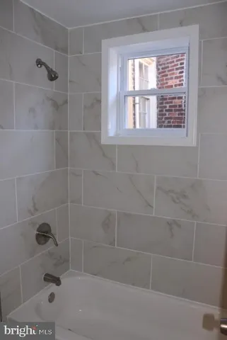 a bathroom with a bathtub