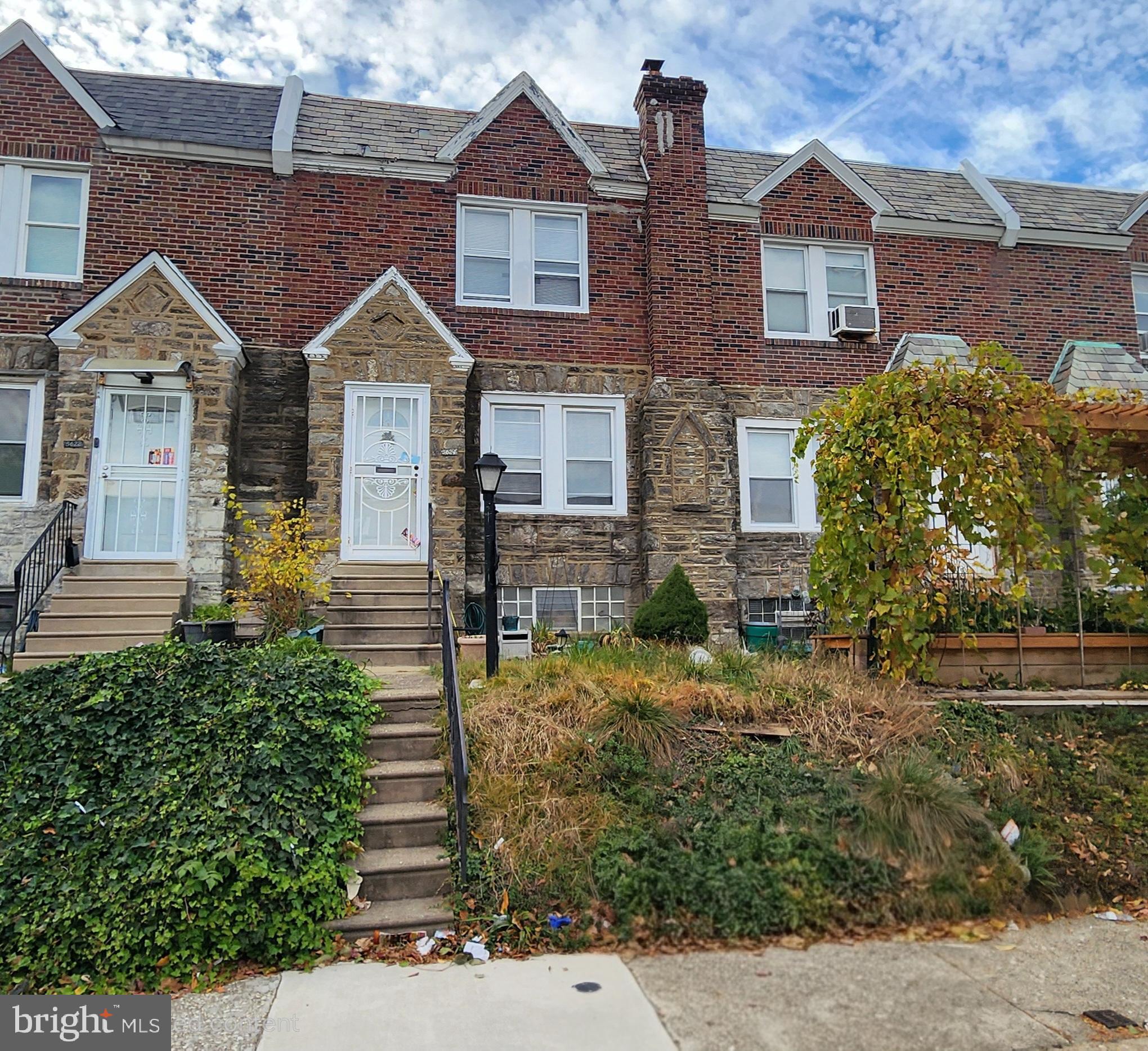 5624 Arbor Street Philadelphia, PA 19120 - Photo 1 of 17 a view of house with yard